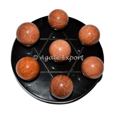 7 Peach Aventurine Ball on  Star of David Black Agate Base