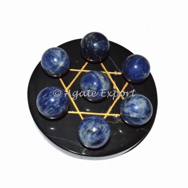 7 Sodalite Ball on  Gold Star of David Black Base