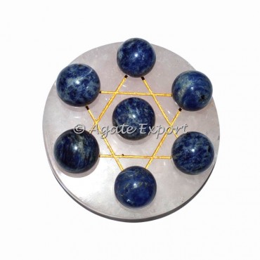 7 Sodalite Ball on  Gold Star of David Rose Base